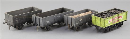 A mineral wagon lettered Caxton, no.32, an N.E. 7 plank open 12T wagon, no.39817, a N.E. 7 plank 12T open
